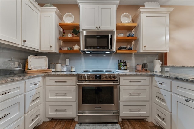 kitchen featuring white cabinetry, stainless steel appliances, dark hardwood / wood-style floors, and light stone countertops