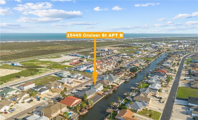 aerial view featuring a residential view and a water view