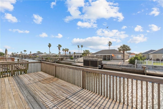 wooden deck featuring a residential view