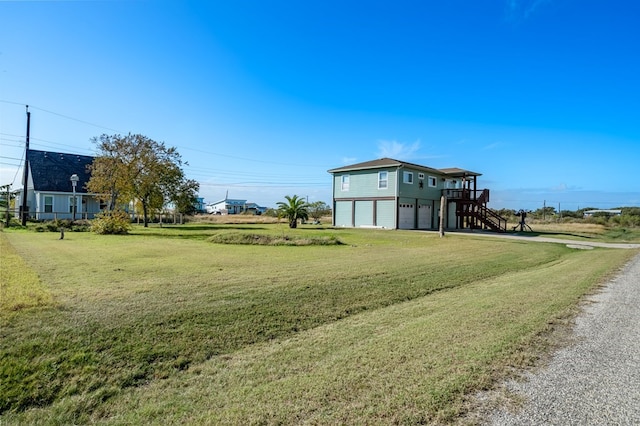 view of yard with a garage