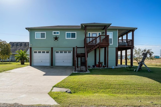 view of front of house with a garage and a front yard