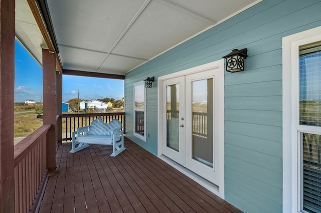 wooden terrace featuring french doors