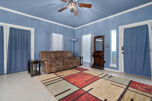 living room featuring ceiling fan, light tile patterned flooring, and ornamental molding