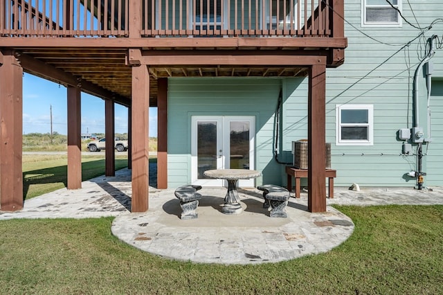 view of patio featuring french doors and a deck