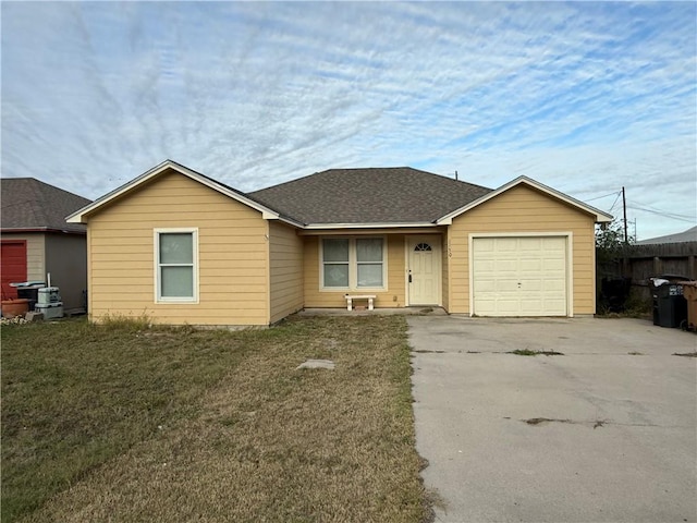 single story home featuring a front yard and a garage