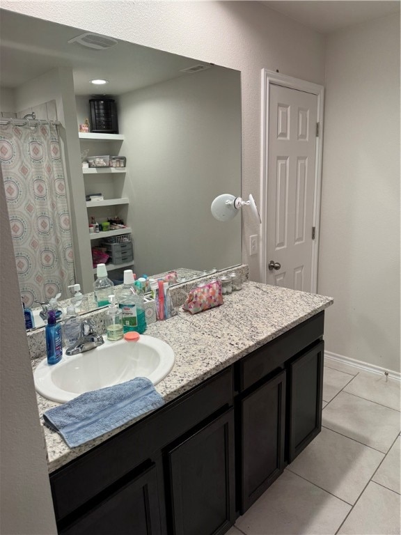 bathroom featuring vanity and tile patterned floors