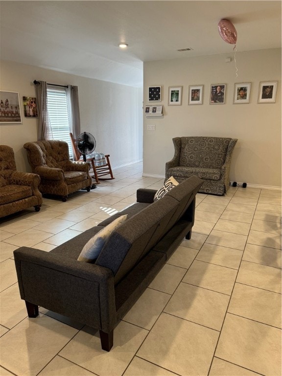 living room featuring light tile patterned floors