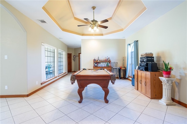 recreation room featuring billiards, ceiling fan, a tray ceiling, and light tile patterned flooring