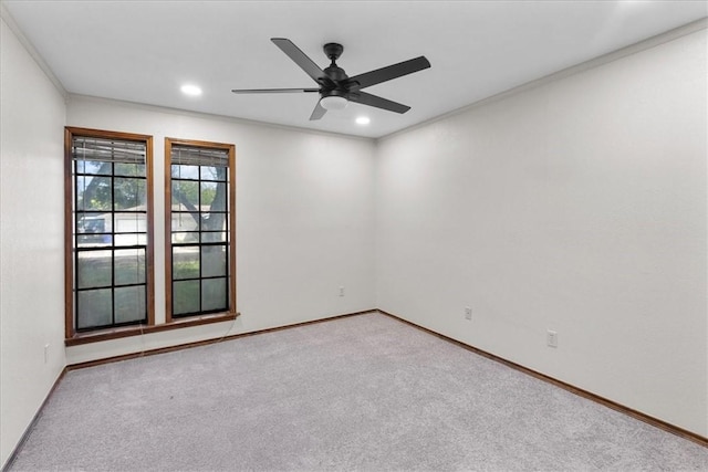 spare room with baseboards, carpet, and recessed lighting