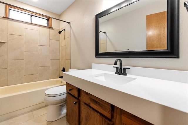 bathroom with vanity, shower / tub combination, tile patterned flooring, and toilet