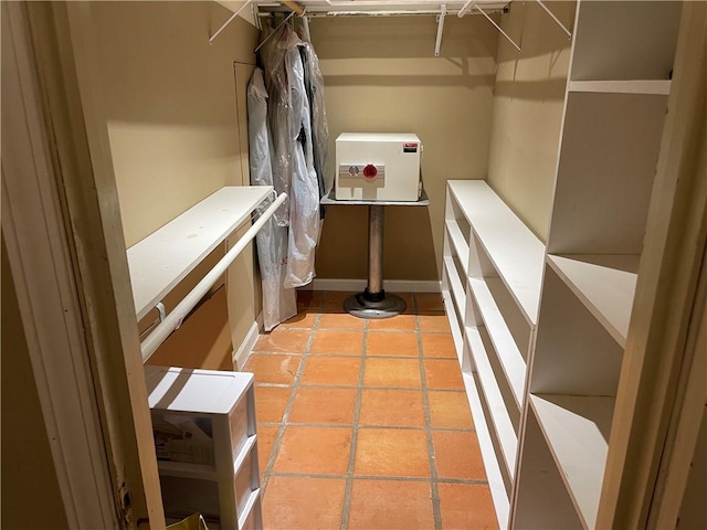 spacious closet featuring tile patterned floors