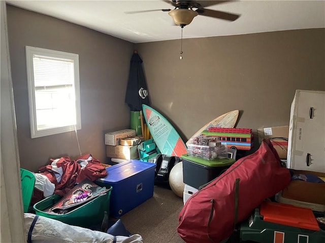 interior space featuring ceiling fan