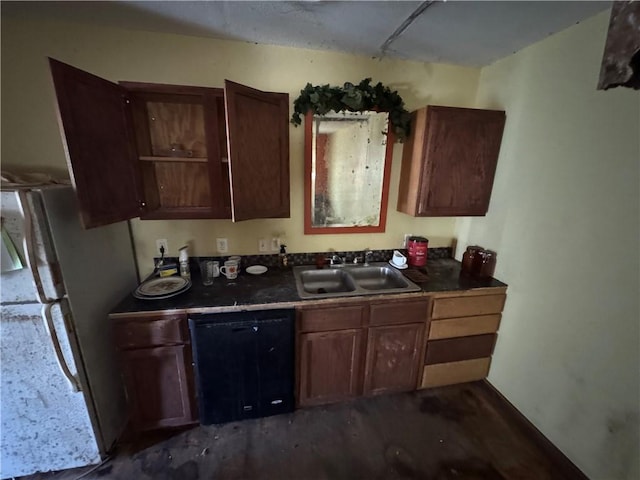 kitchen featuring white refrigerator, black dishwasher, and sink