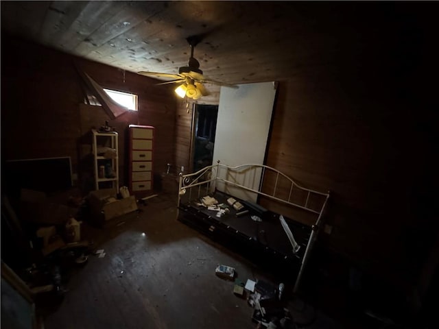 interior space featuring wooden ceiling and ceiling fan