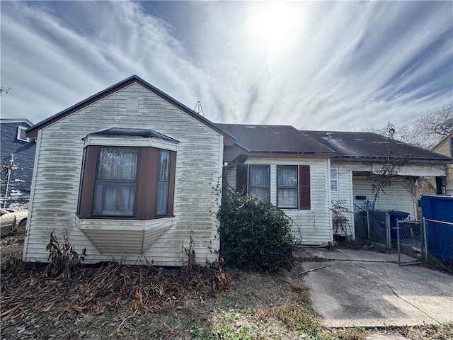 back of property with a patio