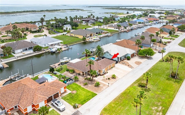 913 Pompano Dr, Aransas Pass, TX 78336 - aerial perspective of suburban area featuring a nearby body of water