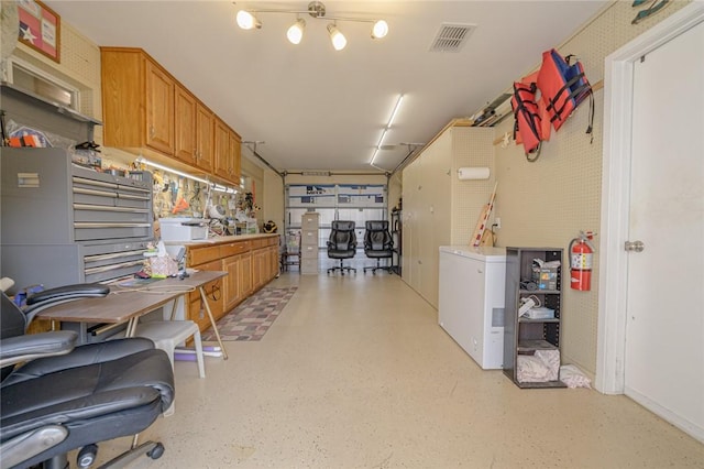 913 Pompano Dr, Aransas Pass, TX 78336 - garage featuring refrigerator