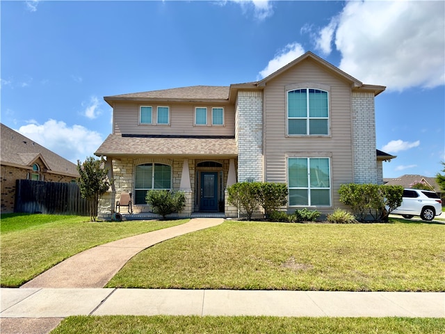 view of front of house with a front lawn