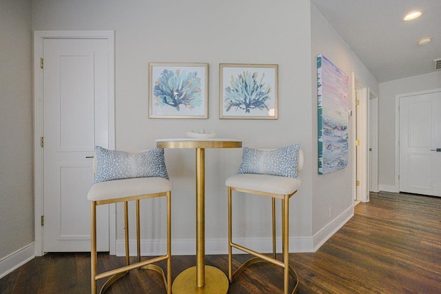 sitting room with wood finished floors, baseboards, and recessed lighting