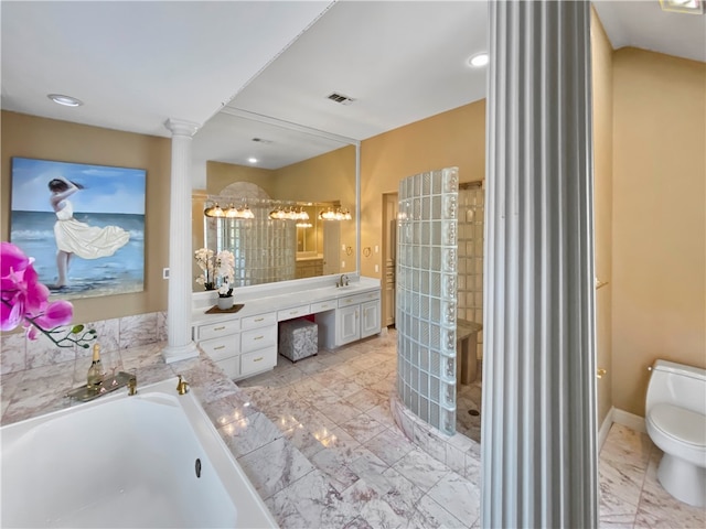 full bathroom featuring ornate columns, vanity, separate shower and tub, and toilet