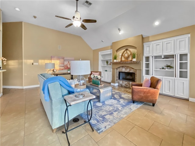 tiled living room with ceiling fan, built in features, and vaulted ceiling