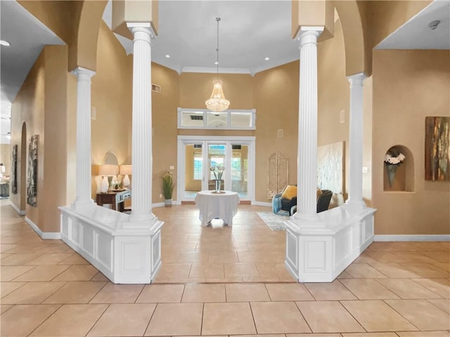 8029 Villefranche Dr, Corpus Christi, TX 78414 - reception area with ornate columns, a towering ceiling, and crown molding