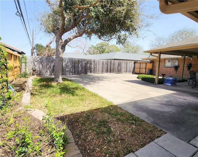 view of yard featuring a patio and fence private yard