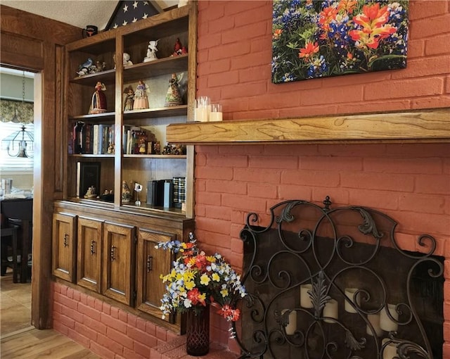 interior space featuring a fireplace and wood finished floors