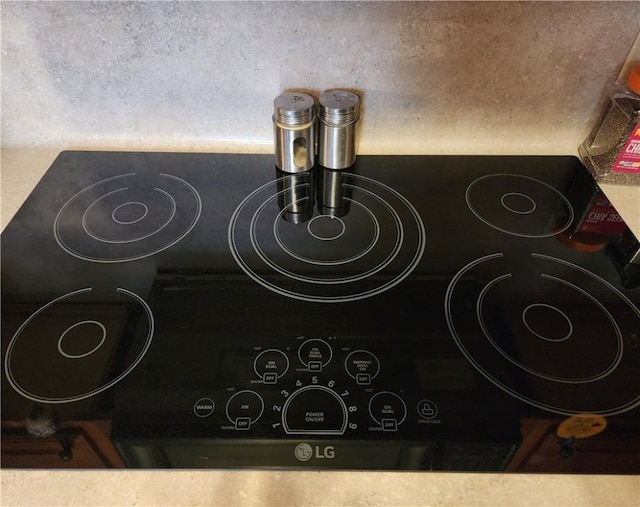 details featuring black electric stovetop