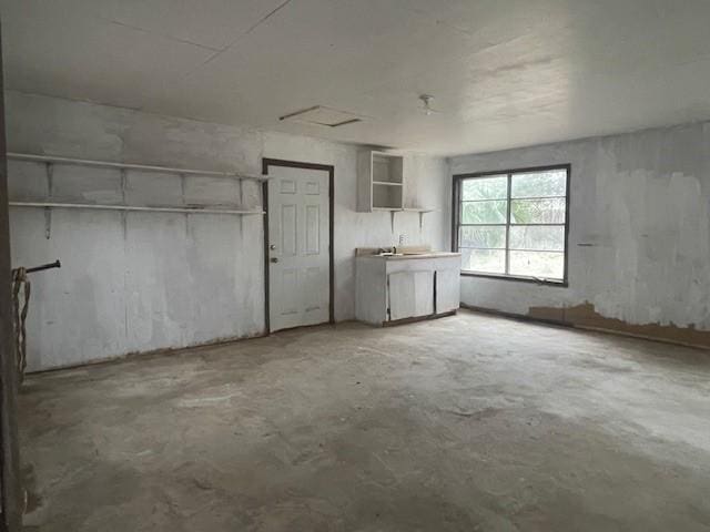 interior space featuring concrete floors