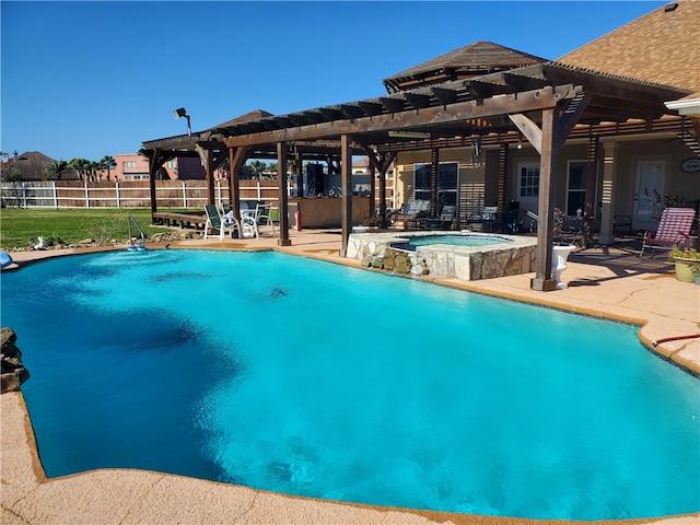 view of pool featuring an in ground hot tub, a pergola, and a patio area