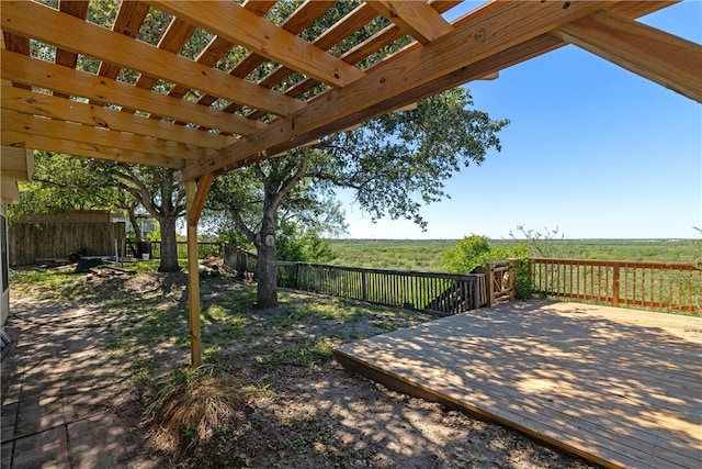 exterior space with a pergola and a wooden deck