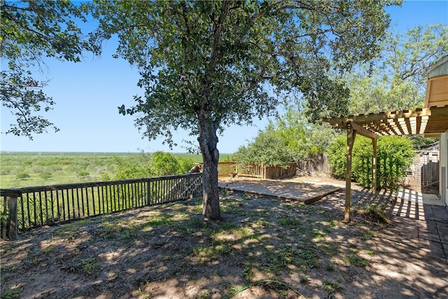 view of yard with a pergola and a patio area