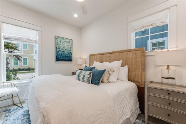 709 Sunrise Ave, Port Aransas, TX 78373 - bedroom with a ceiling fan, wood finished floors, and recessed lighting