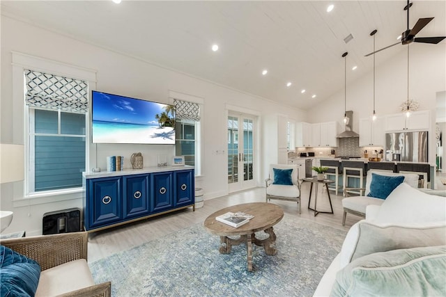 709 Sunrise Ave, Port Aransas, TX 78373 - living area featuring recessed lighting, a ceiling fan, light wood finished floors, and high vaulted ceiling