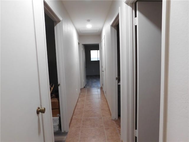 1408 Rose Dr, Alice, TX 78332 - corridor featuring light tile patterned floors