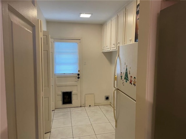 5218 Wooldridge Rd, Corpus Christi, TX 78413 - laundry area featuring light tile patterned floors and hookup for an electric dryer