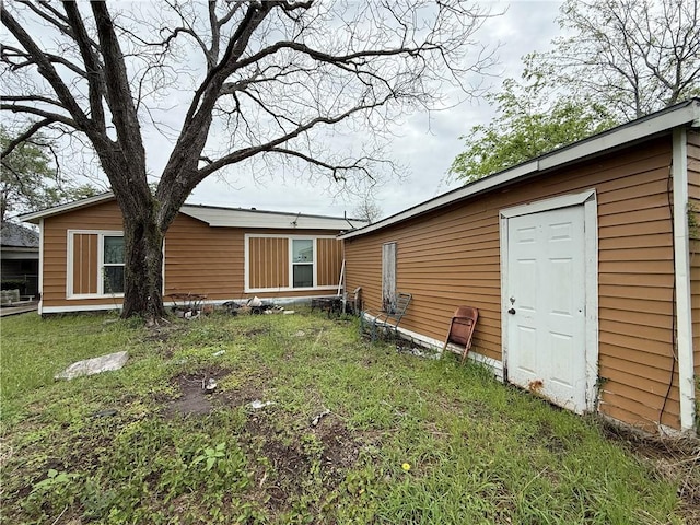 exterior space with a yard
