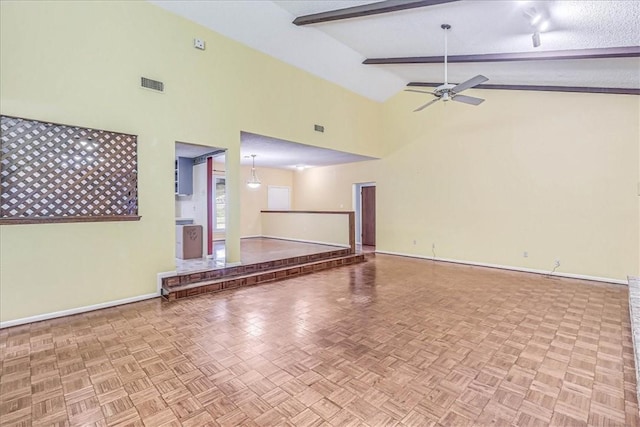 unfurnished living room with high vaulted ceiling, beam ceiling, light parquet flooring, and ceiling fan