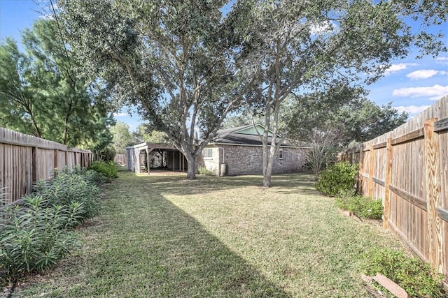 view of yard with a storage unit