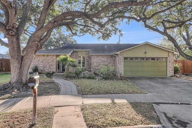 ranch-style home featuring a garage