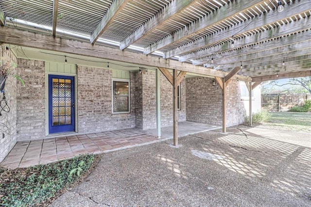 view of patio featuring a pergola