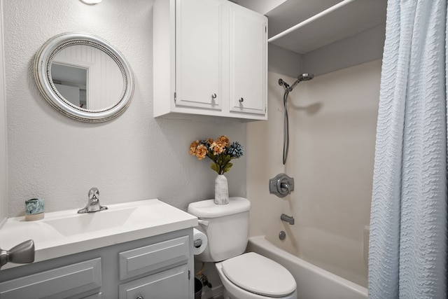 full bathroom featuring vanity, toilet, and shower / tub combo