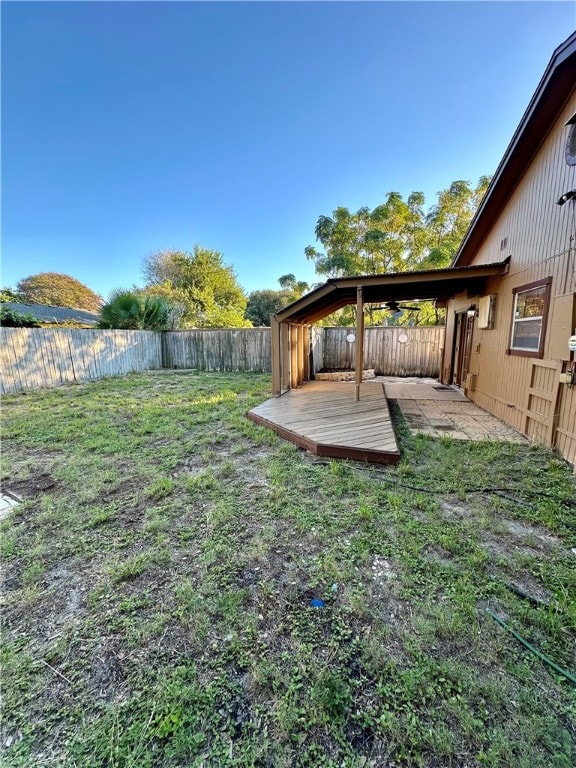 view of yard with a deck