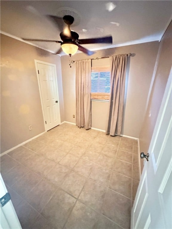 unfurnished room featuring ceiling fan