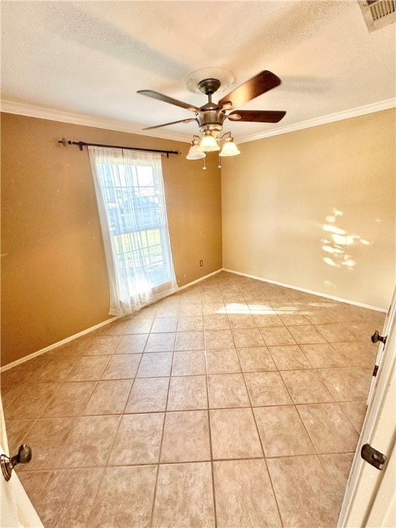 empty room with ornamental molding, a textured ceiling, and ceiling fan