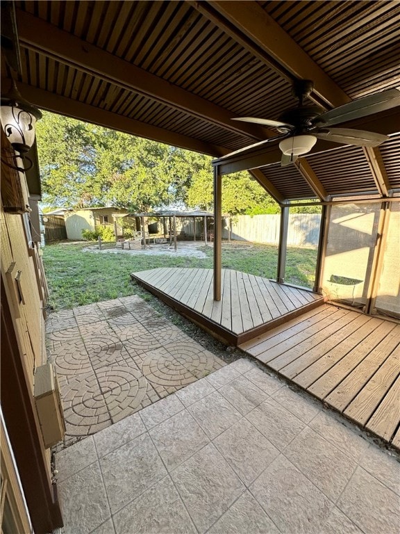 exterior space featuring ceiling fan, a yard, and a patio