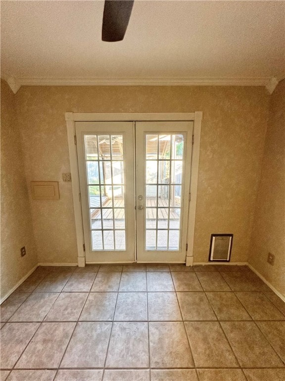 doorway with ceiling fan, a textured ceiling, french doors, and crown molding