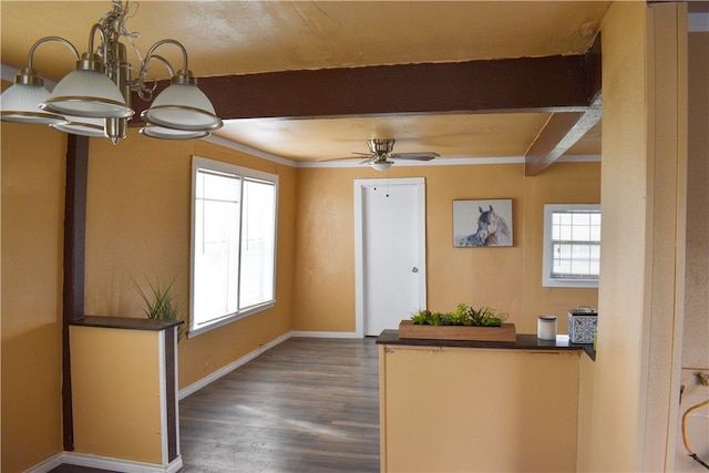 foyer entrance featuring ceiling fan with notable chandelier, dark wood-type flooring, and beamed ceiling