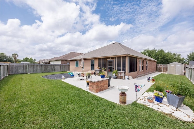 6005 Tapestry Dr, Corpus Christi, TX 78414 - back of property featuring a patio area, a storage unit, an outbuilding, and a sunroom